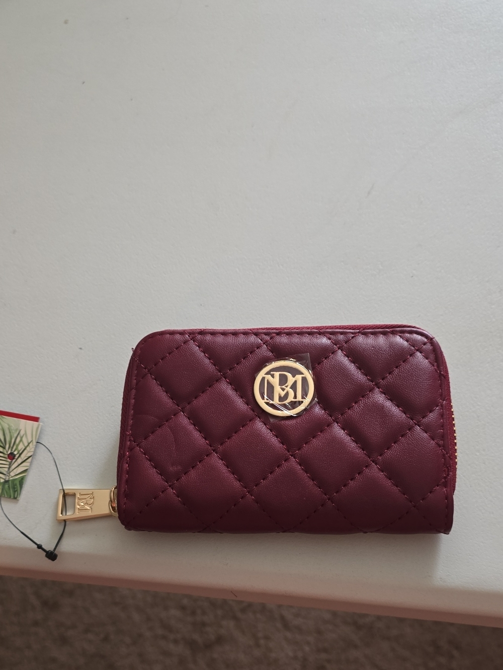 Badgley Mischka Quilted Wine Zip Card Wallet with Gold Logo